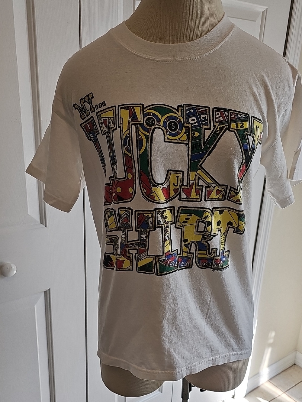 Dimand Dust, White Graphic 'Lucky Shirt' Tee. Size Meduim.